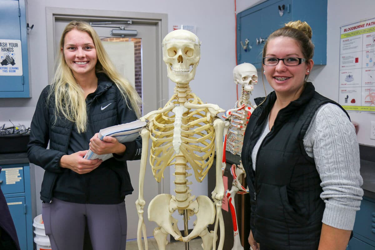 Healthcare Management students and skeleton